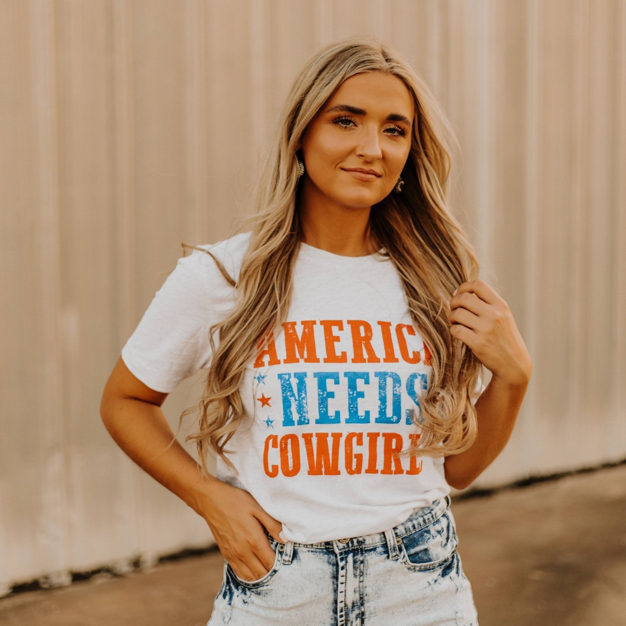 America Needs Cowgirls Graphic Tee