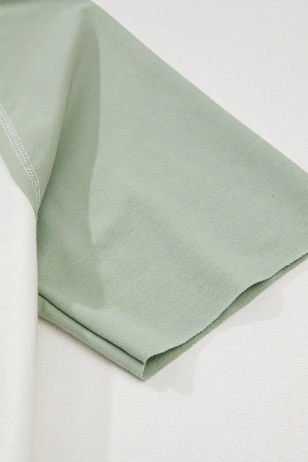 Color Block Raglan Short Sleeve Half Buttons High Low T Shirt